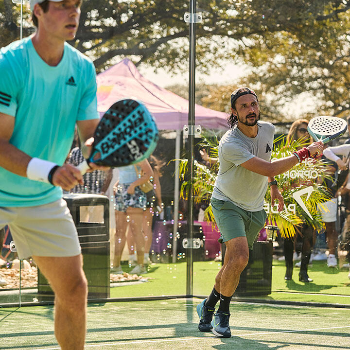 Padel39 Two male players on court at Padel39.